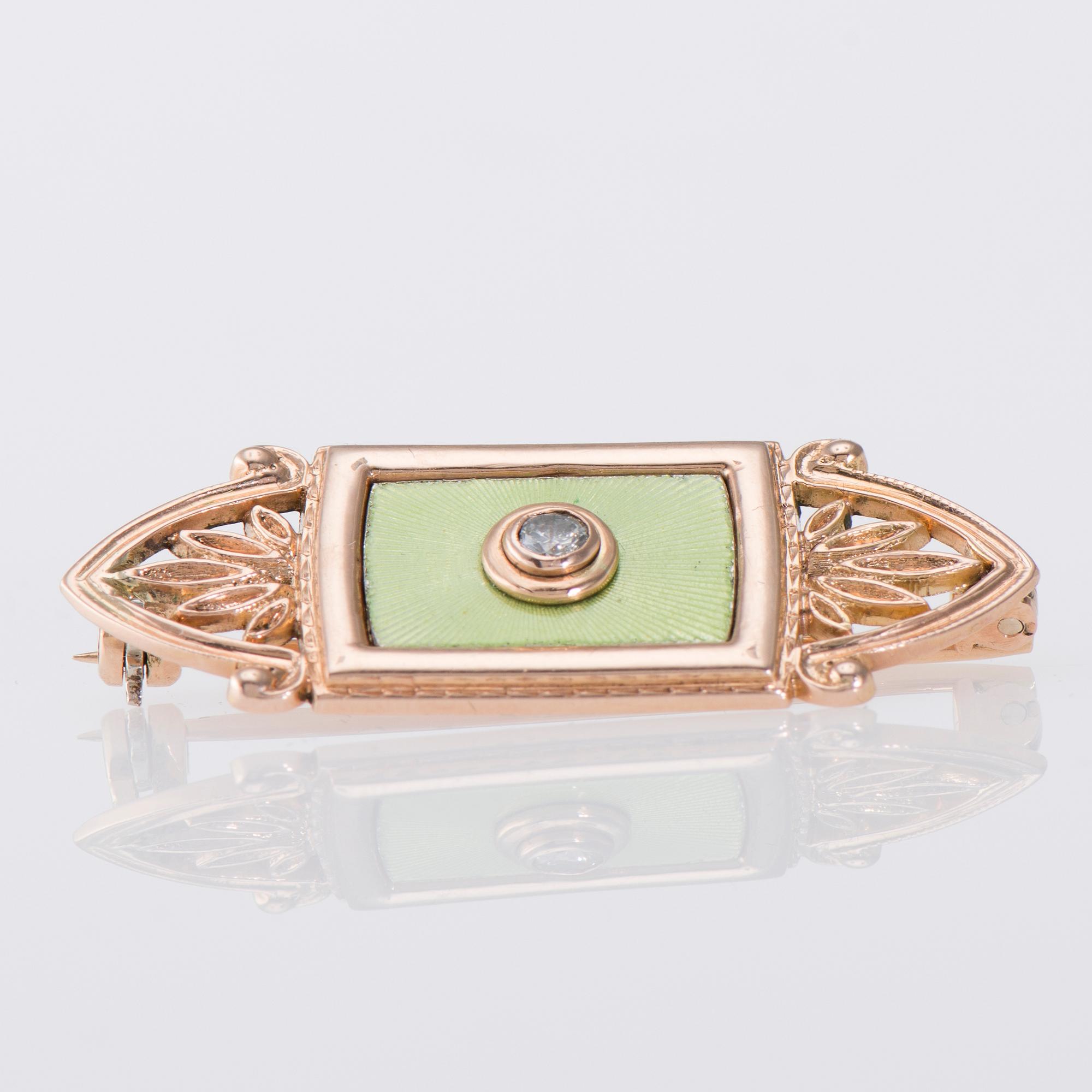 BROSCH, 14K guld, emaljering, briljantslipad diamant ca 0,12 ct. Ryska stämplar 1900-talets slut. Vikt 8,1 g.