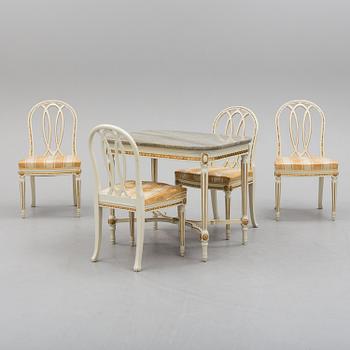 A first half of the 20th century Gustavian style five pcs furniture suite.