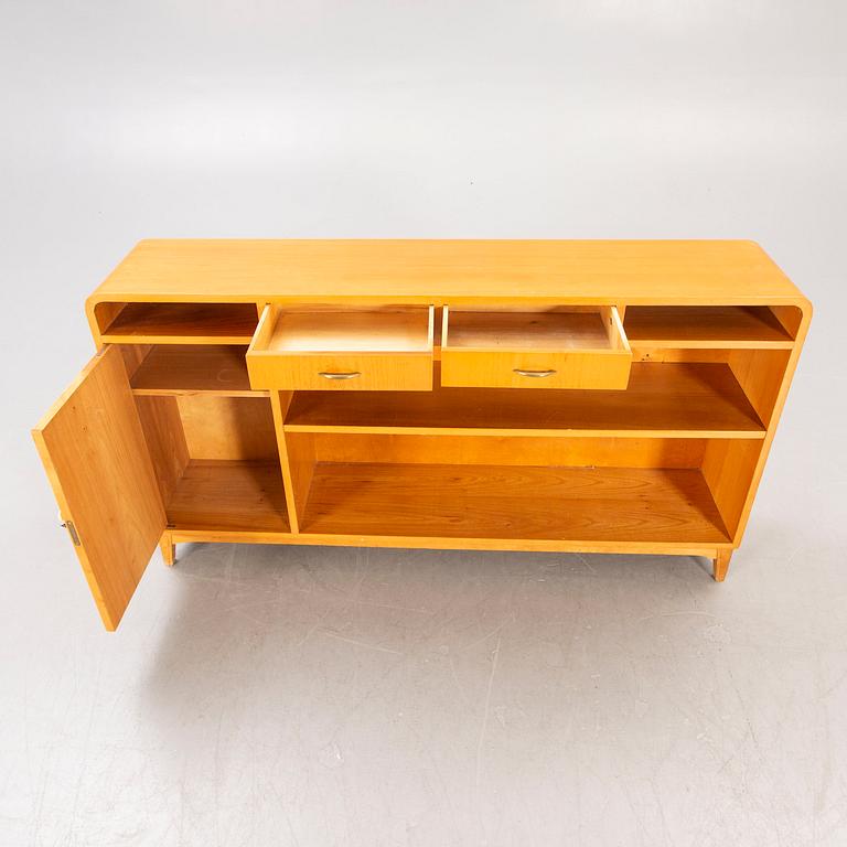 A 1940s birch book shelf.