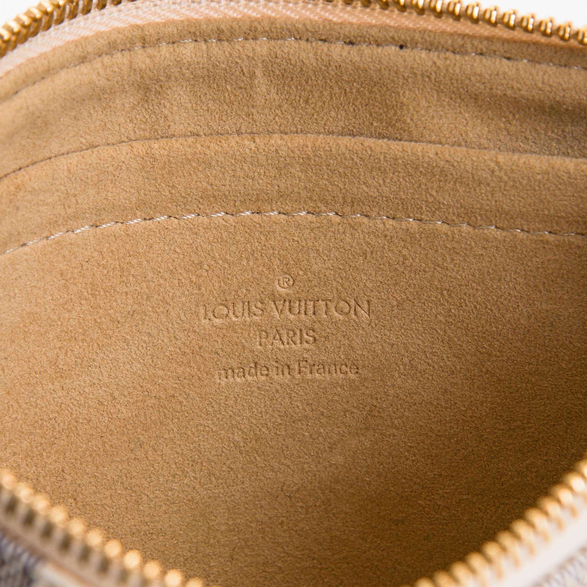 Louis Vuitton, a Damier Azur 'Milla MM Pochette' bag.