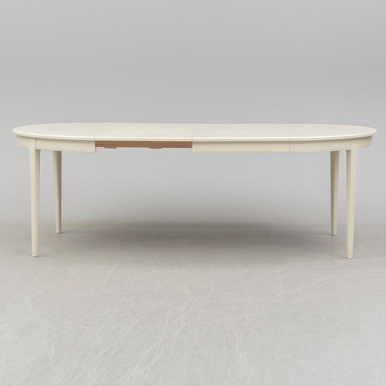 A dining table with six chairs by Carl Malmsten, Bodafors, 1960s.