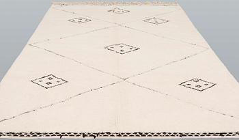 A moroccan carpet, ca 300 x 200 cm.