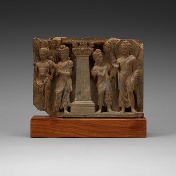 116. A schist relief with Buddha and attendants,
Gandhara, presumably 2nd/3rd century.