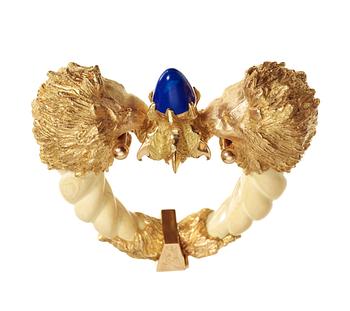 567. Kristian Nilsson, A Kristian Nilsson 18k gold, bone and lapis lazuli bangle, Stockholm, 1972.