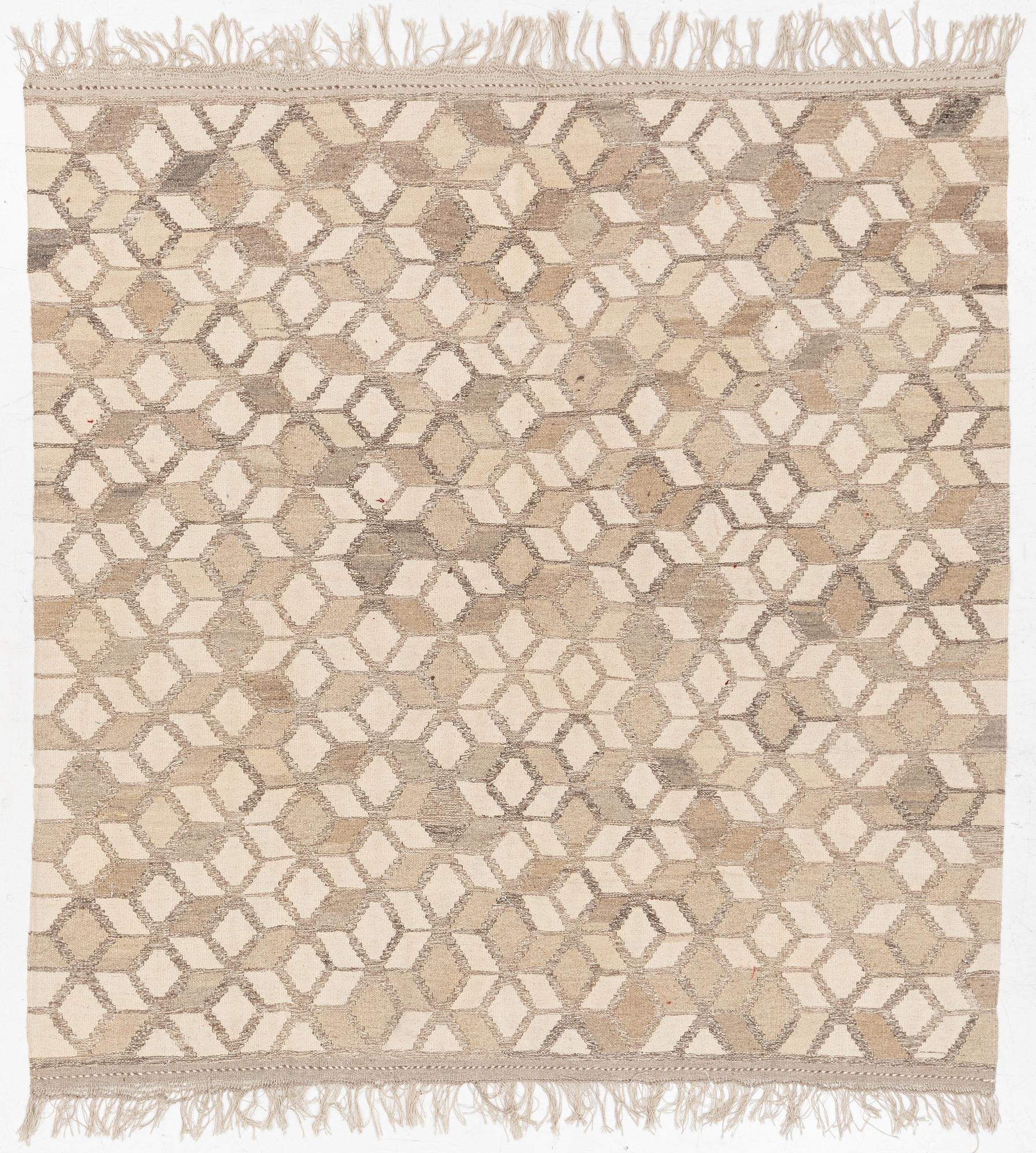 A Kelim carpet, c. 224 x 216 cm.
