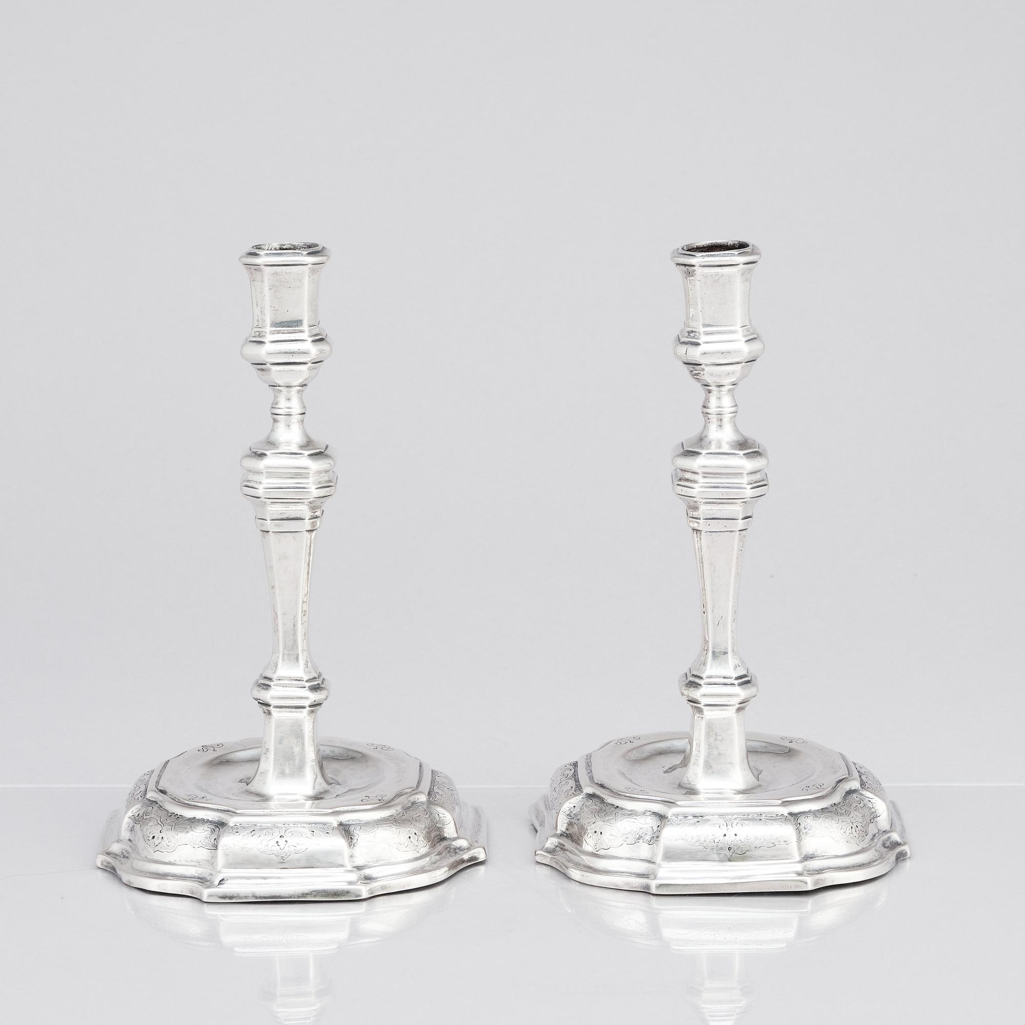 A pair of Swedish early 18th century silver candlesticks, mark of Petter Ersson Lund, Stockholm 1727.