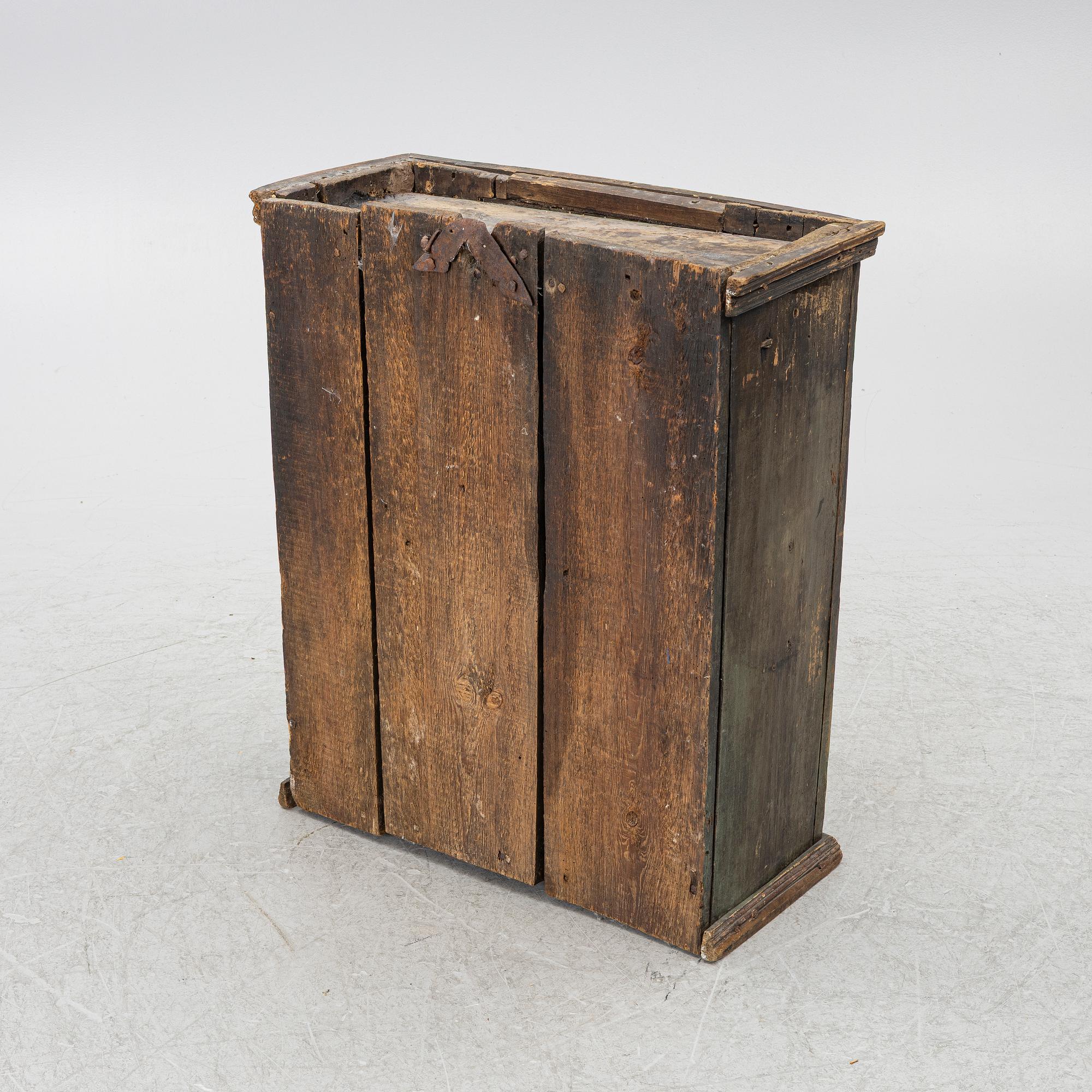 A wall-hanged cabinet, Sweden, dated 1796.
