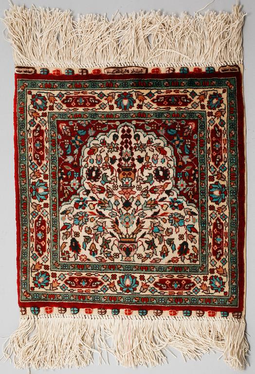Four silk rugs/pads, probably Hereke, ca 33 x 33 cm.