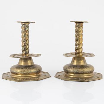 A pair of brass candlesticks, Baroque style, circa 1900.