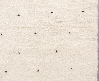 A Moroccan carpet, approx. 292 x 209 cm.