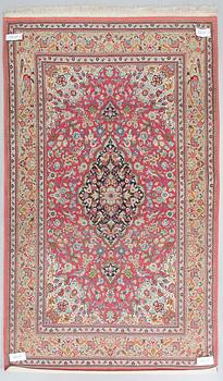 A silk Qum rug, central Persia, approx. 232 x 137 cm.