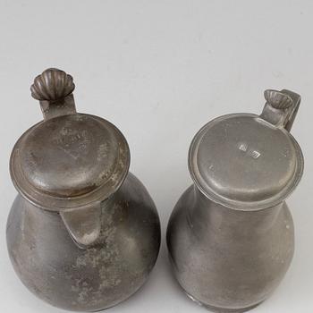 A PEWTER WINE JUG AND MUG, 18TH century.