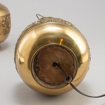 A pair of Chinese brass table lamps, 20th century.