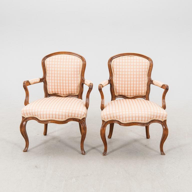 A pair of 19th century Rococo style armchairs.