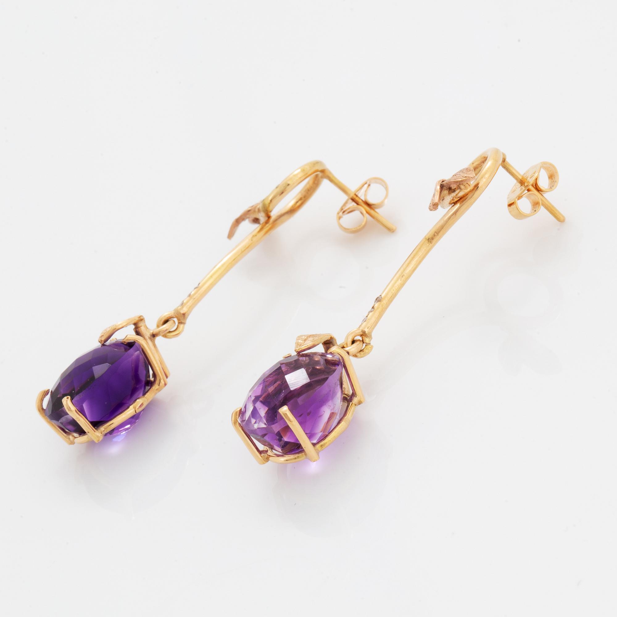 Oval briolette cut amethyst and brilliant-cut diamond earrings.
