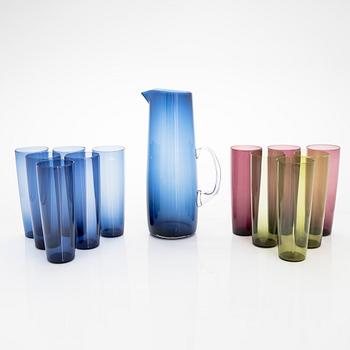 Iittala, a set of 12 drinking glasses by Tapio Wirkkala, model 2204, and a glass pitcher by Erkki Vesanto, model 2438.