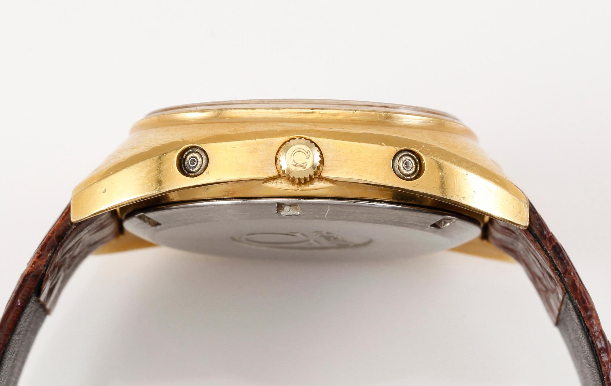 ARMBANDSUR, guld på stål, Omega, Megaquartz 32 KHz, Genève.