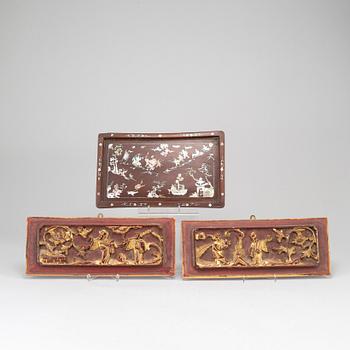 A wooden tray and two panels, Qing dynasty, 19th Century.