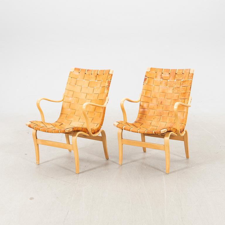Two 'Eva' easy chairs by Bruno Mathsson for Firma Karl Mathsson dated 1964.