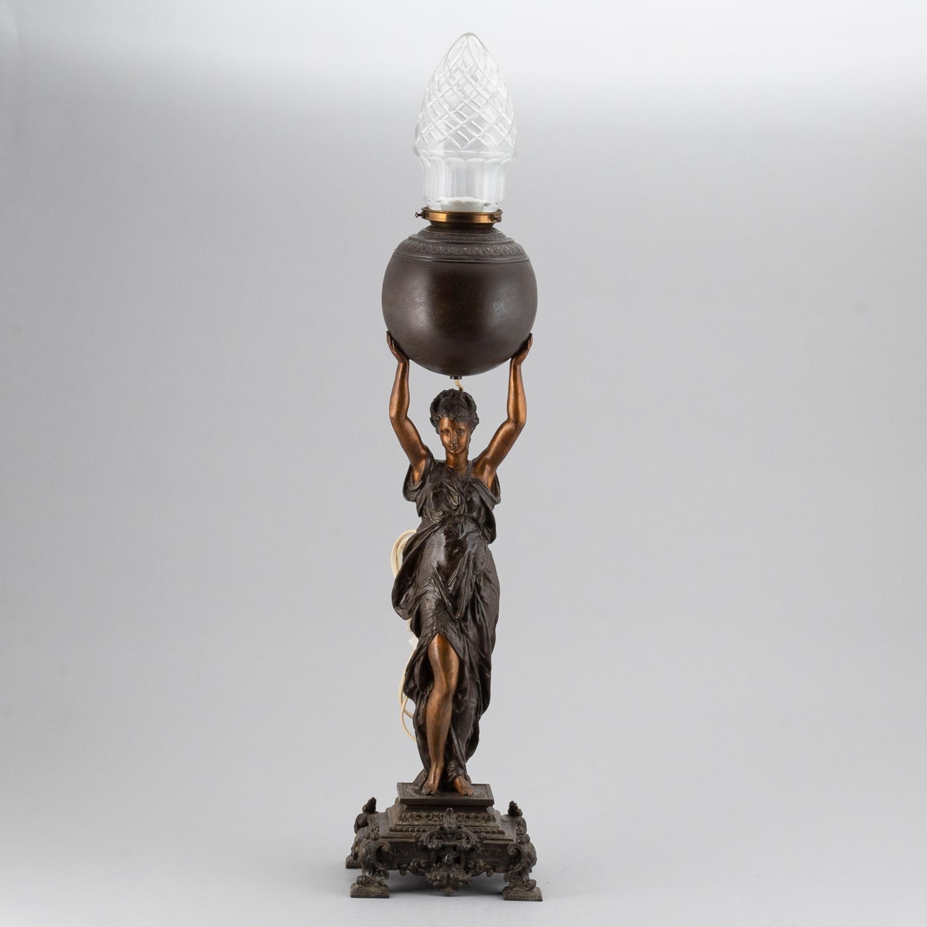 A spelter table light, circa 1900.