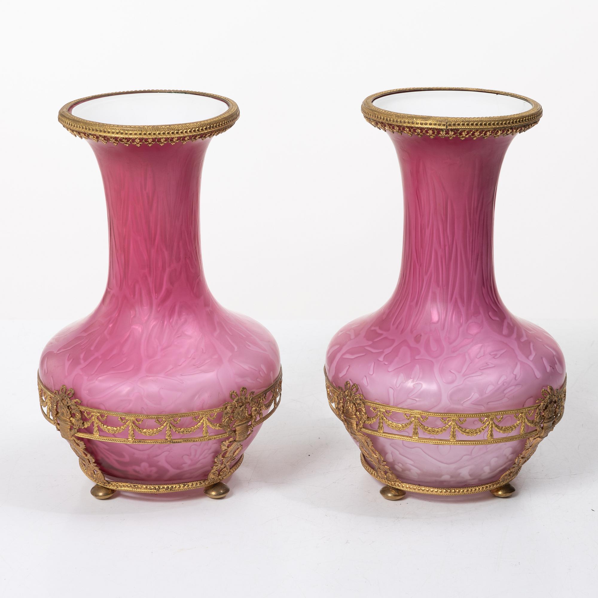 A pair of Louis XVI style vases, circa 1900.