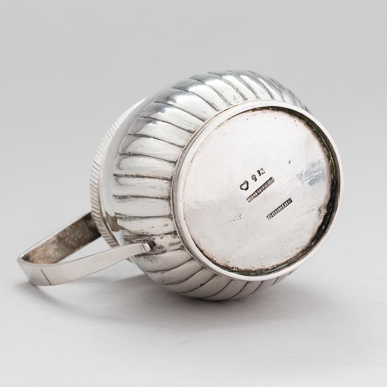 A silver, cream jug, Cyrillic maker's mark Sinkoni, Finland 1824.