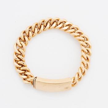 A 14K gold bracelet.