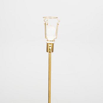 An NK 1960s brass floor lamp.