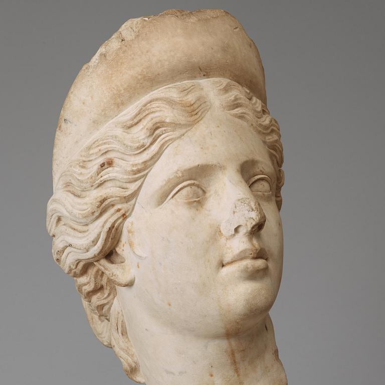 A marble portrait head of a woman with diadem, Roman 150 AD or later ie until modern times.