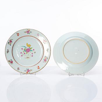 A set of 14 Chinese famille rose dinner plates, Qing dynasty, Qianlong (1736-95).