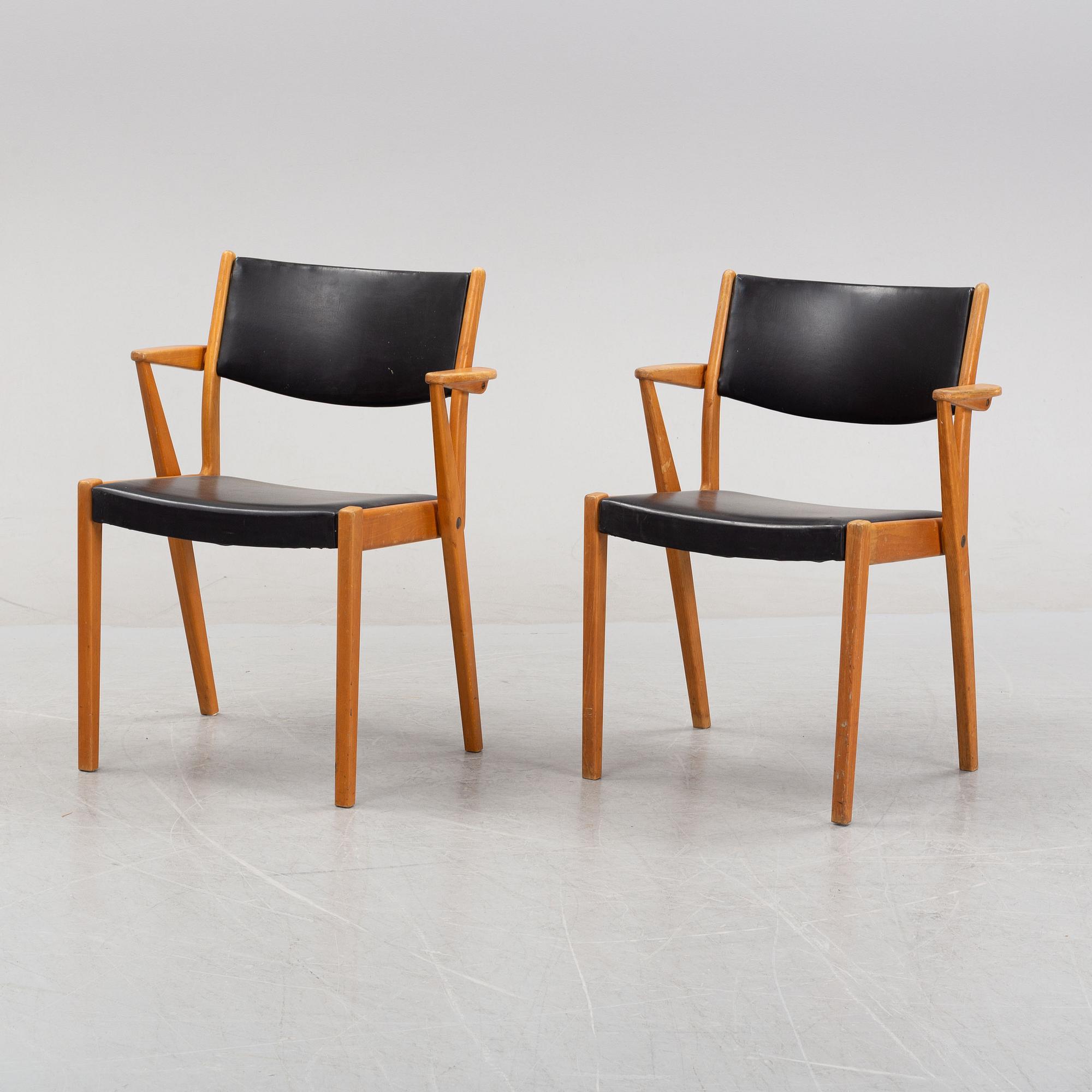 A pair of 1950's/60's armchairs.