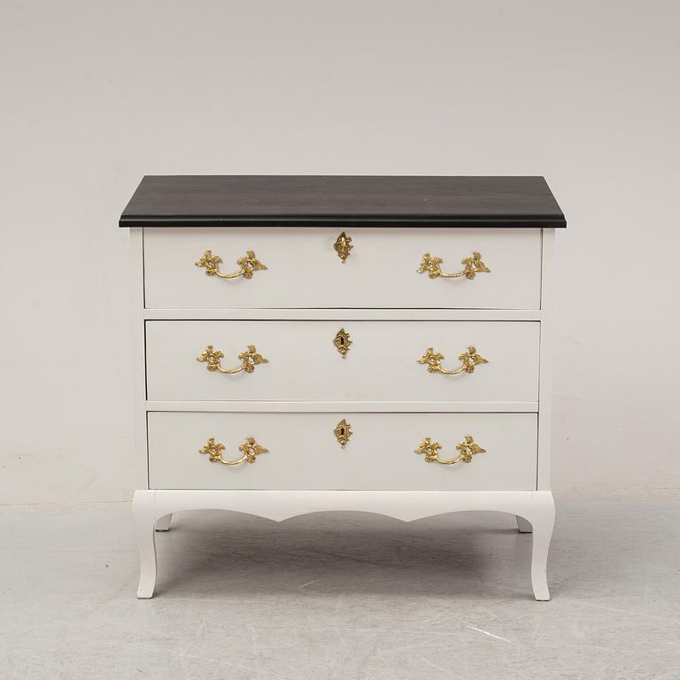 A painted chest of drawers, mid 20th Century.