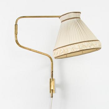 A mid-20th century wall light for Saariston Valaisin.