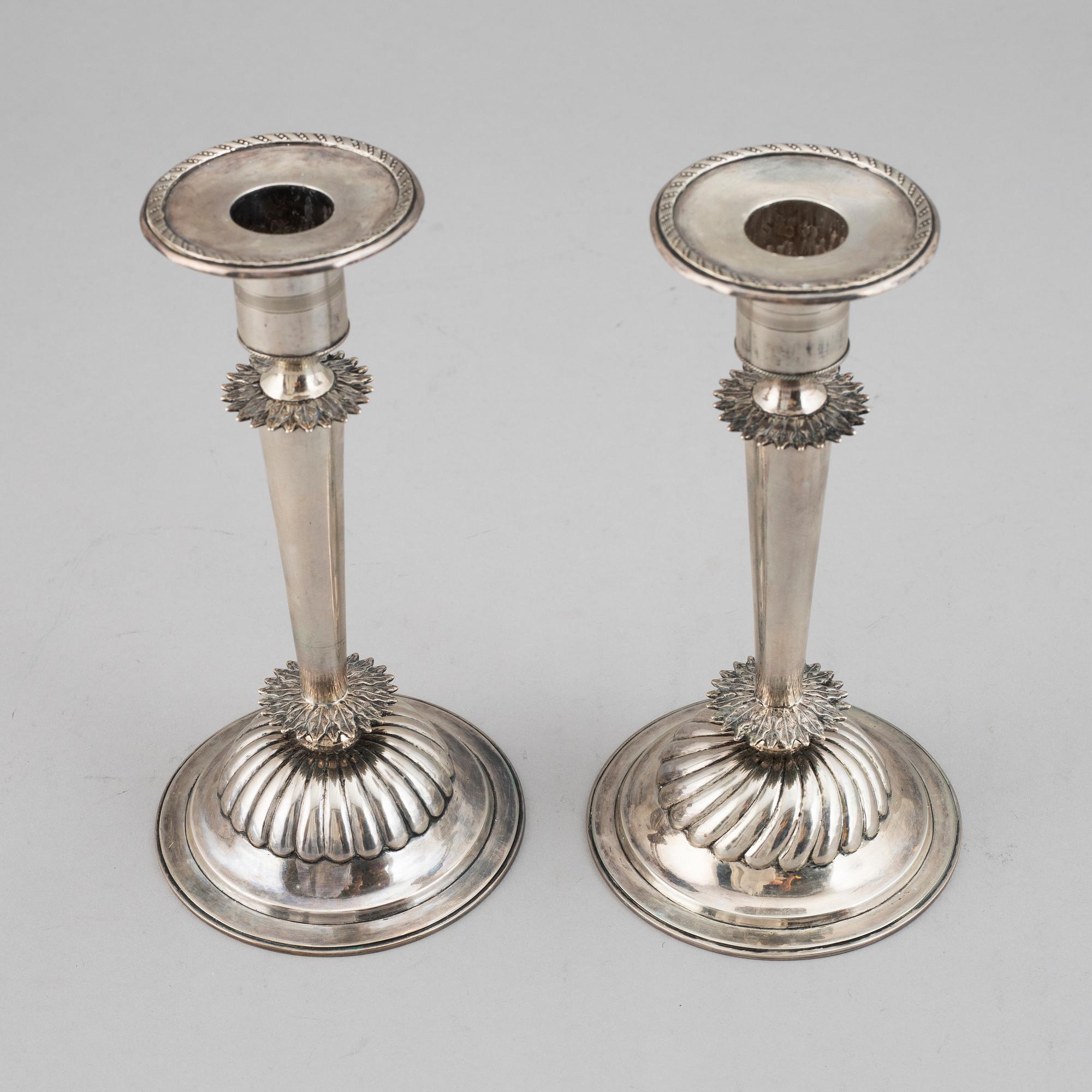 A pair of Empire silver candle sticks, 1823.