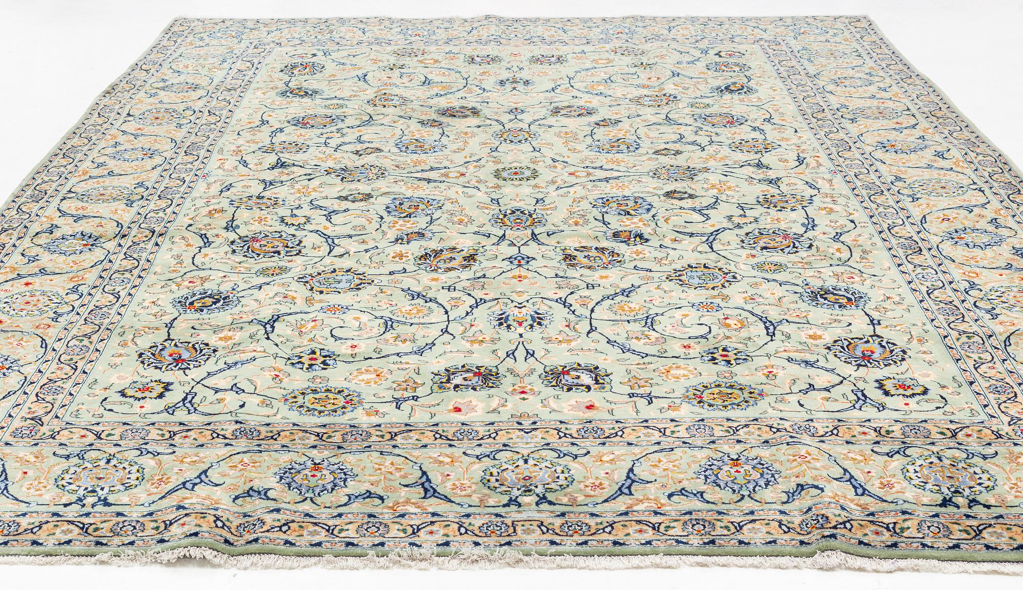 A carpet, semi-antique Najafabad, ca 420 x 306 cm.
