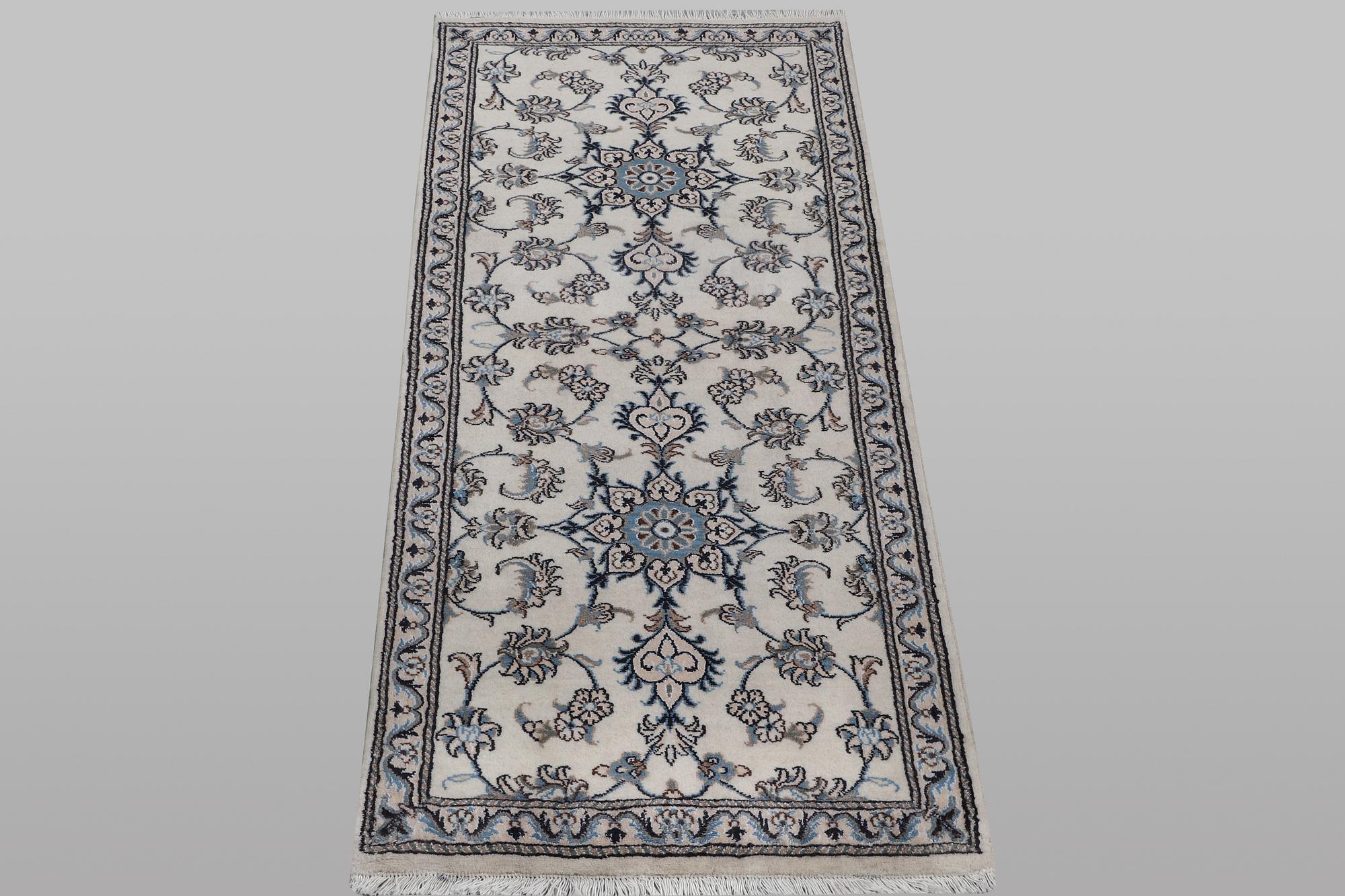 A runner carpet, Nain, part silk, ca 197 x 77 cm.