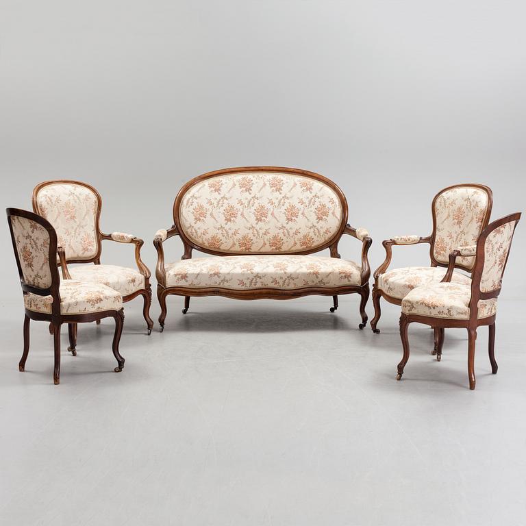 A sofa, two armchairs and two chairs, rococo style, first half of the 20th century.