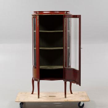 A circa mid 20th century vitrine.