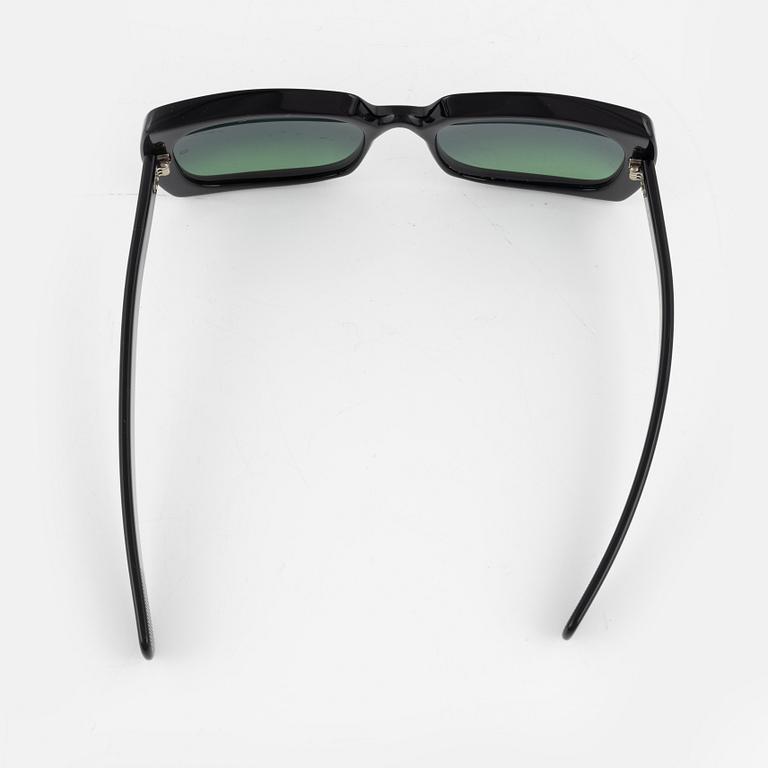 Oliver Goldsmith, a pair of "Fuz" sunglasses.