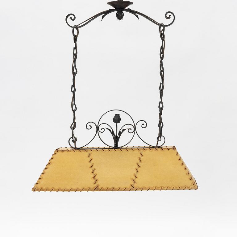 A chalet style mid century modern ceiling lamp.