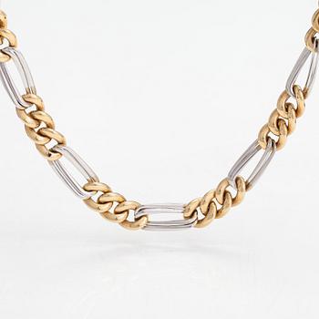 A 14K white and yellow gold necklace.