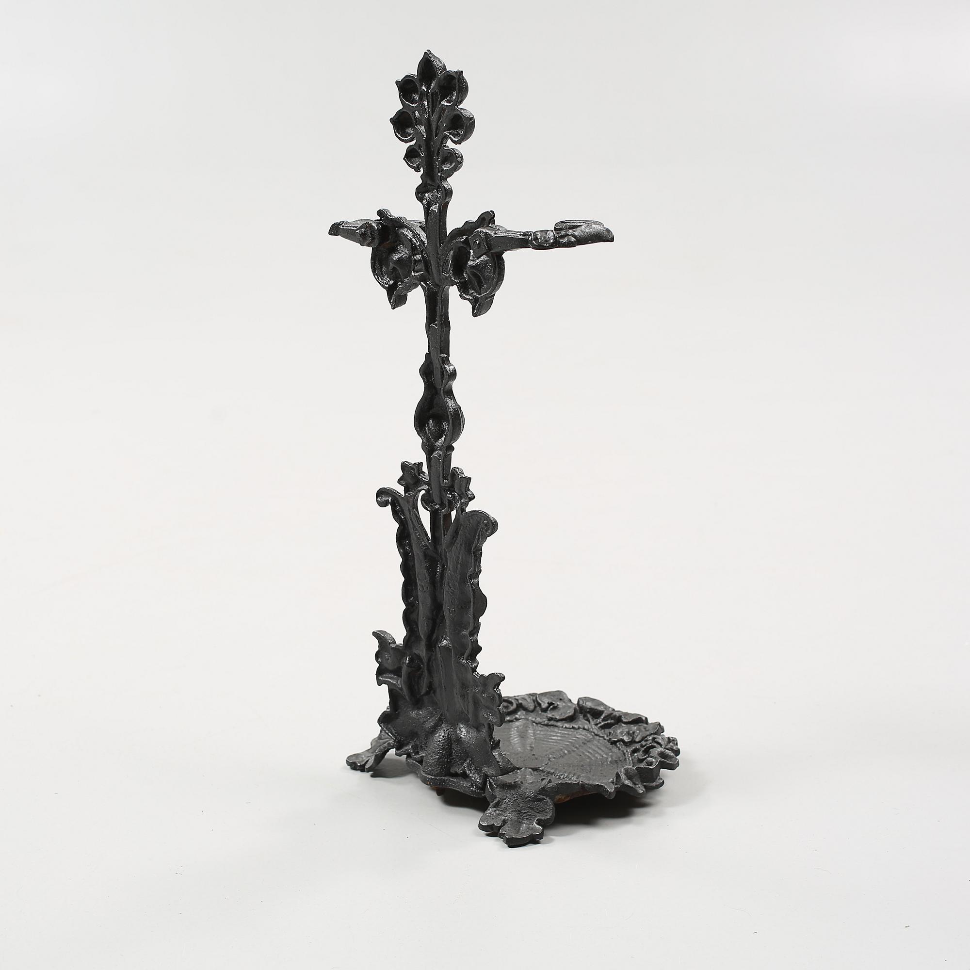 PARAPLYSTÄLL, gjutjärn, 1900-talets första hälft.