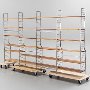 A 1950s "String" four-section book shelf by Nils Strinning.