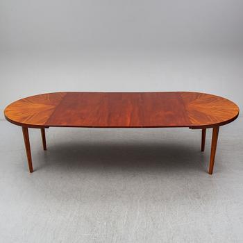 a mahogany dining table from the mid 20th century.
