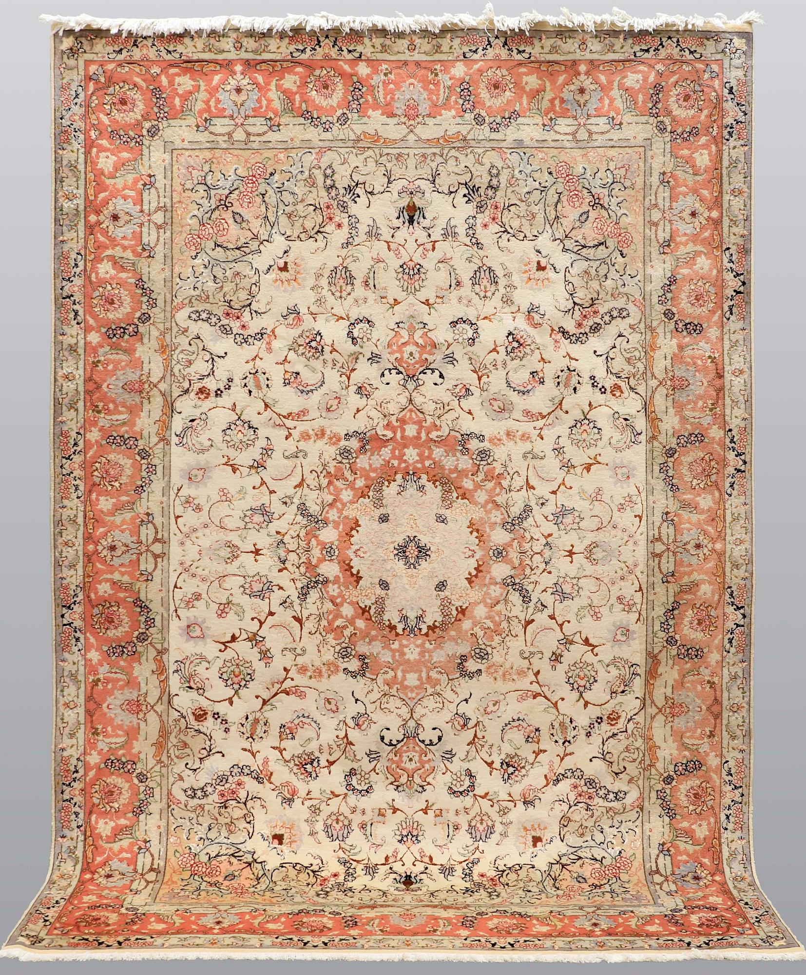 A carpet, Tabriz part silk, ca 302 x 200 cm.
