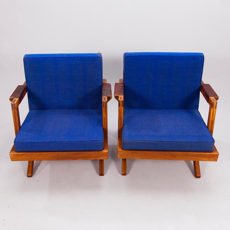 OLAVI HÄNNINEN, A 1960s 'Bumerang' armchairs for HMN Huonekalu Mikko Nupponen, Lahti, Finland.