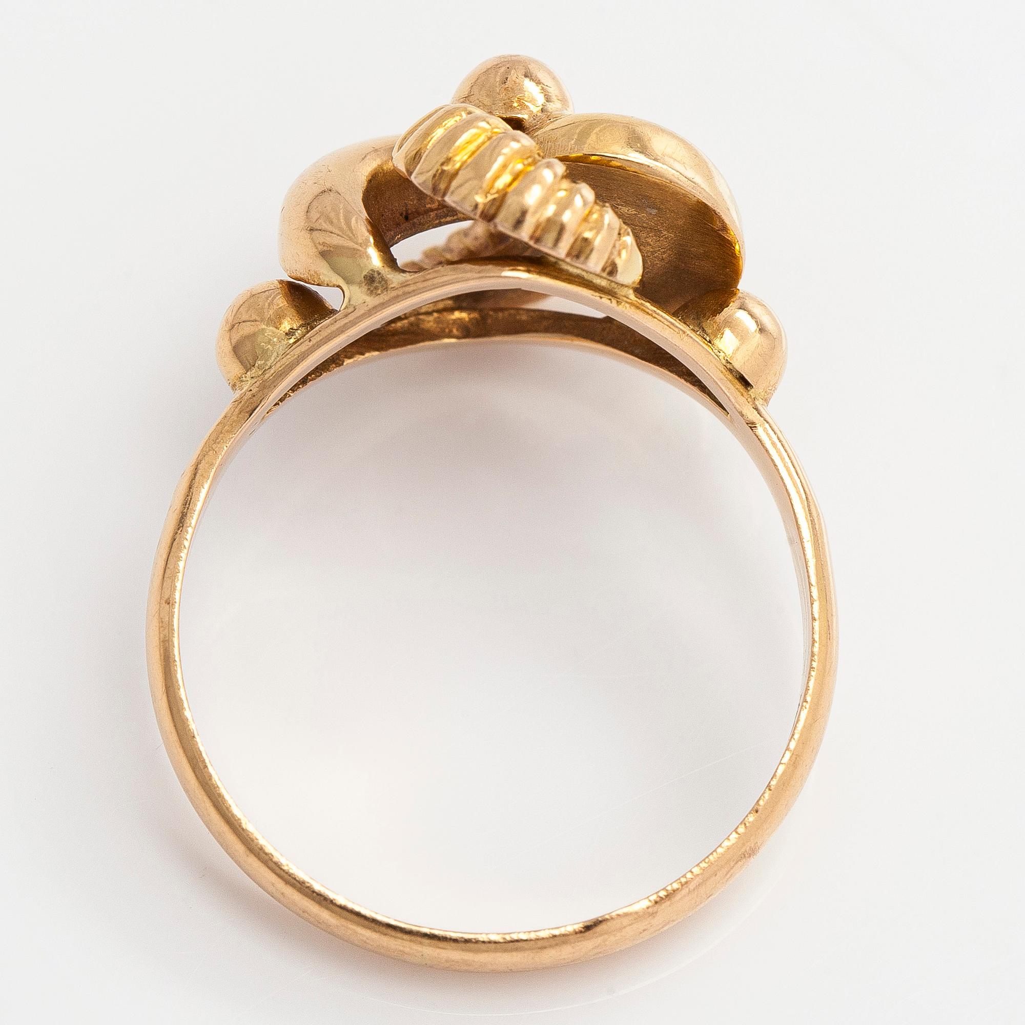 A 14K gold ring.