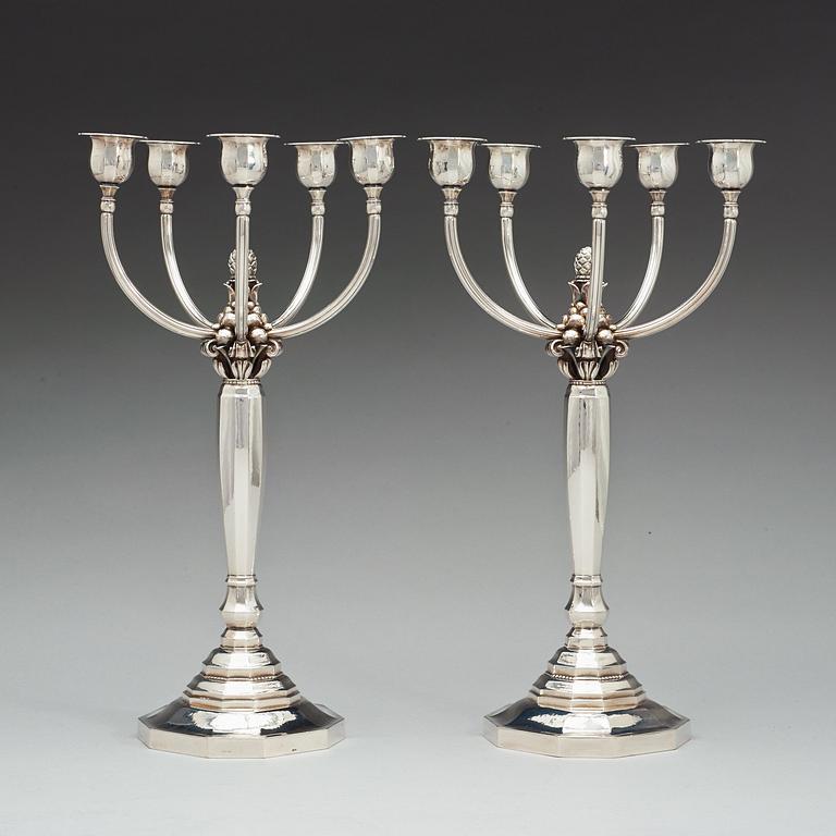 A pair of Johan Rohde sterling candelabra, Georg Jensen, Copenhagen, Jensen & Wendel 1945-51. Design nr 474.