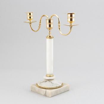 A late Gustavian brass and marble candelabra/candle holder, around the year 1800.