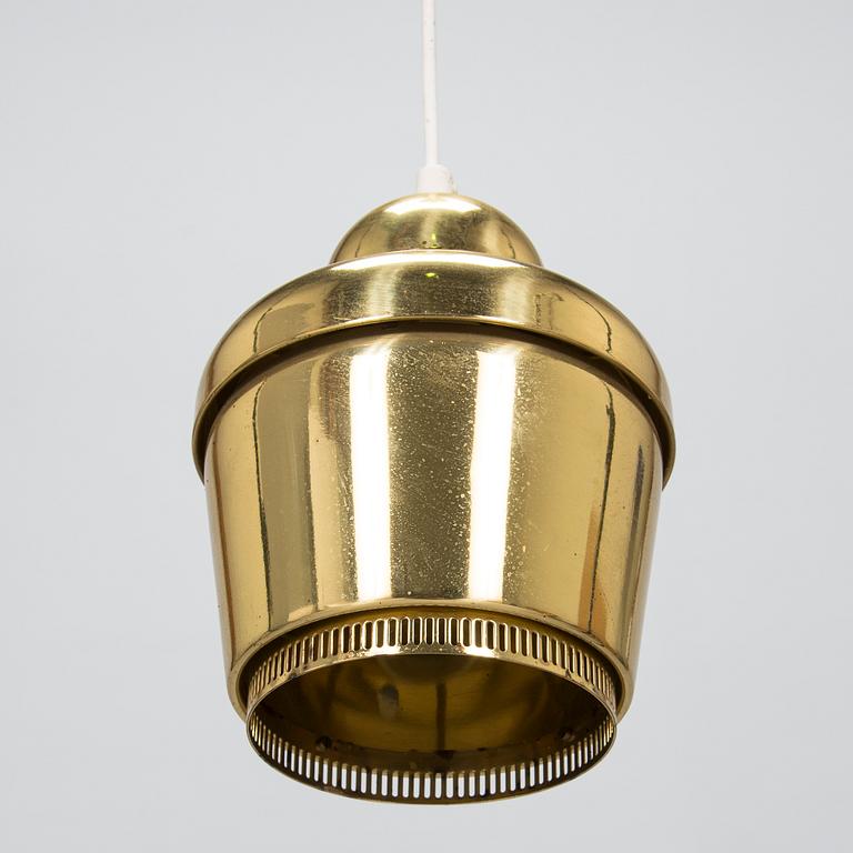 Alvar Aalto, a 'Golden bell' ceiling pendant light, model "A 330", Valaisinpaja Oy Finland.